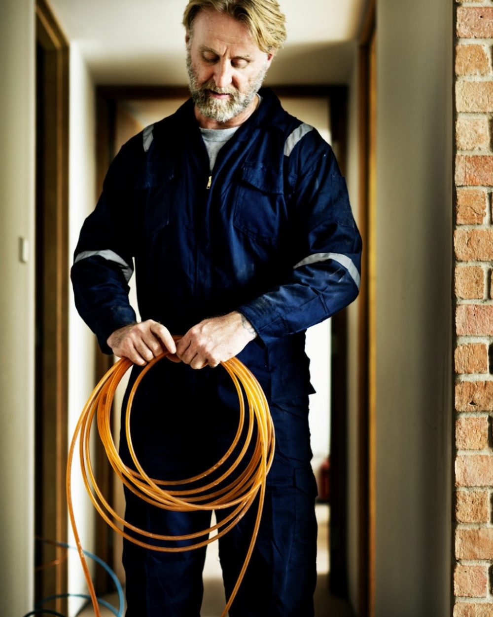 Electrician working house repair installation Electrician working house repair installation